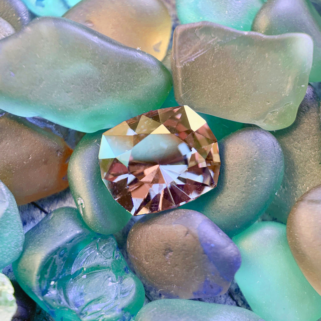 Natural spinel gemstone — ethically sourced and untreated — vivid pink, gray, and purple hues — CBQ International.