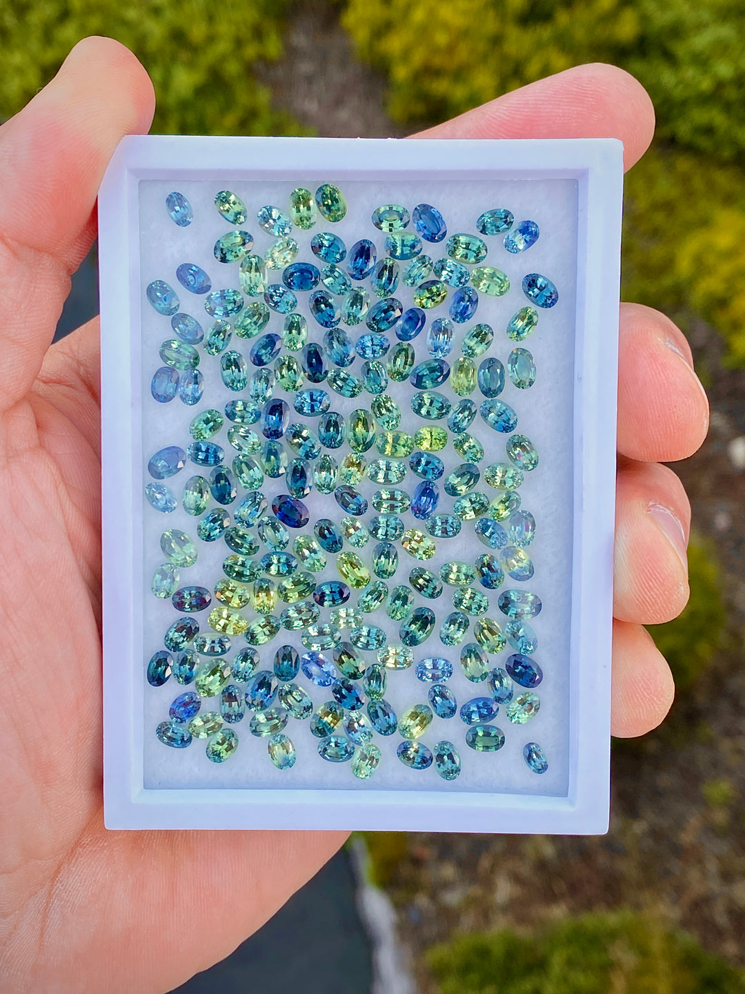 Wholesale gemstone parcel — mixed sapphires, spinel, and tourmaline — ethically sourced by CBQ International.