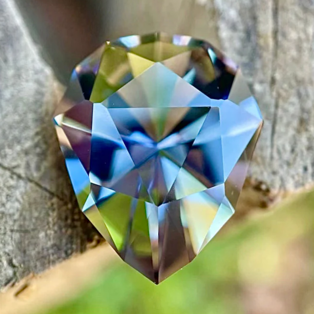 Unheated Tanzanite gemstone — teal, violet, and mermaid hues — ethically sourced from Merelani Hills.
