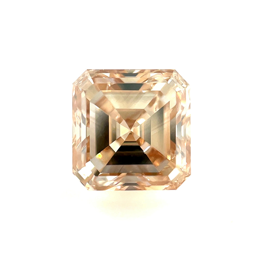A stunning 1.01-carat champagne fancy brown diamond in an Asscher cut, displaying elegant step facets and exceptional clarity (VS2). Ethically sourced from South Africa, this natural diamond is perfect for a bespoke engagement ring or fine jewelry.