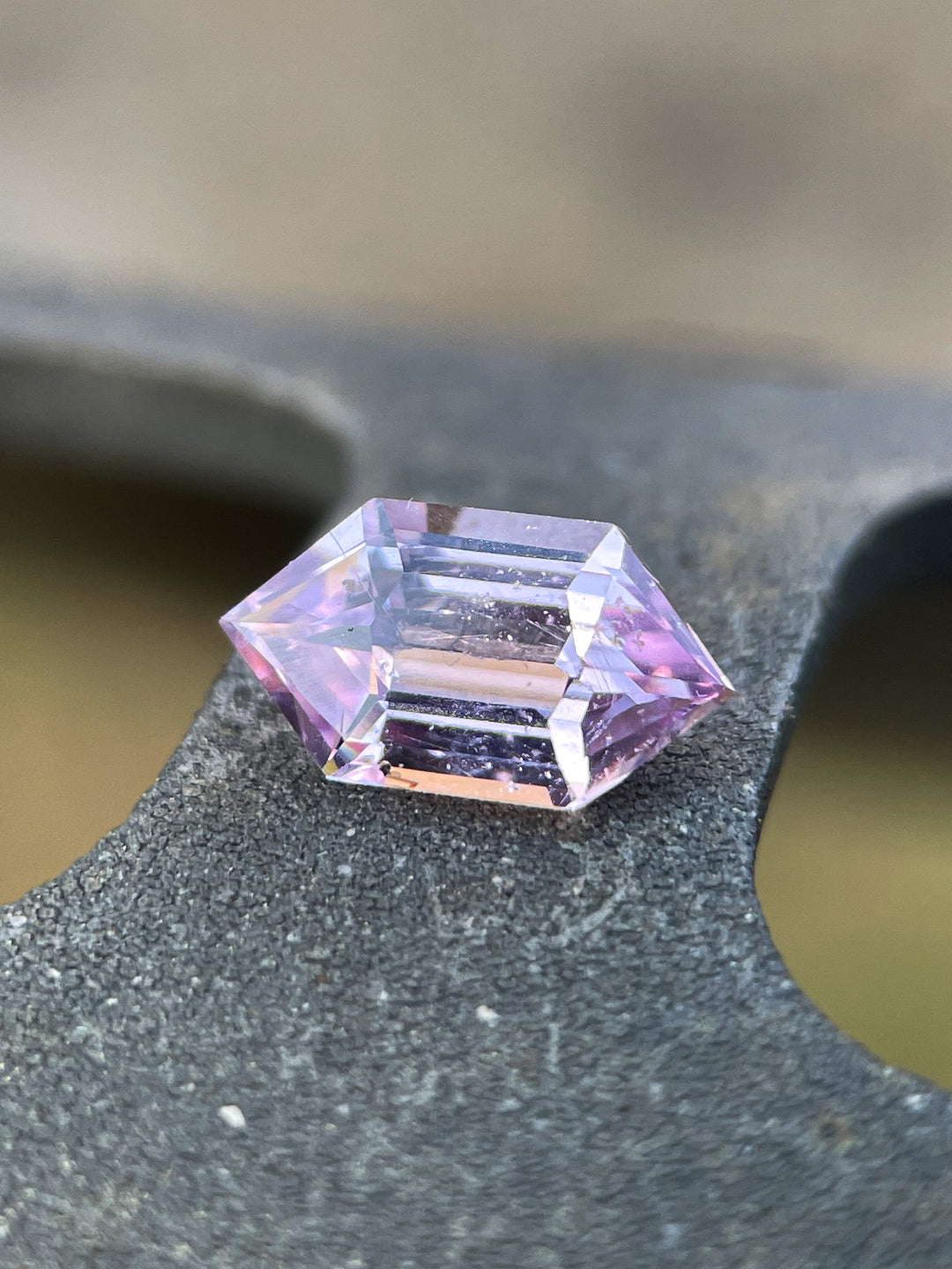 A stunning 1.05-carat pale yellow sapphire in a custom shield cut, ethically sourced from Sri Lanka, with a natural brilliance and no treatment.