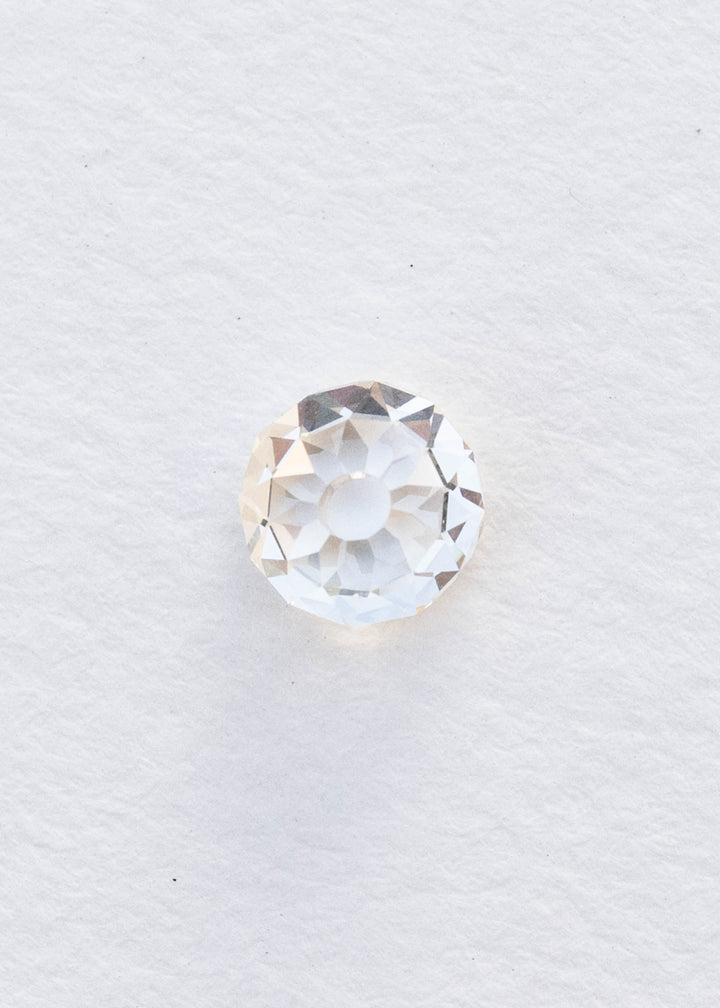 1.06 carat round Mughal cut South African diamond photographed face-up on white, showing its symmetrical circular outline, open central table and radiating broad facets.