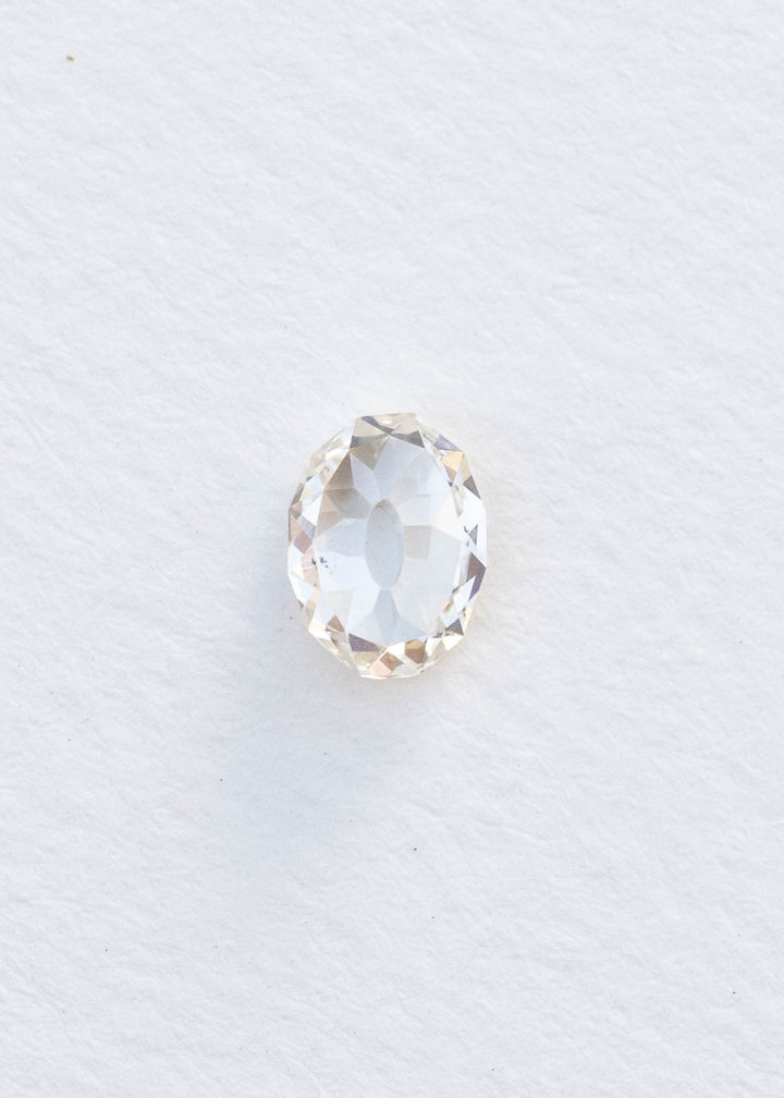Face-up 1.09 carat oval Mughal cut South African diamond on a white background, showing its elongated outline, open central table and broad irregular facets.