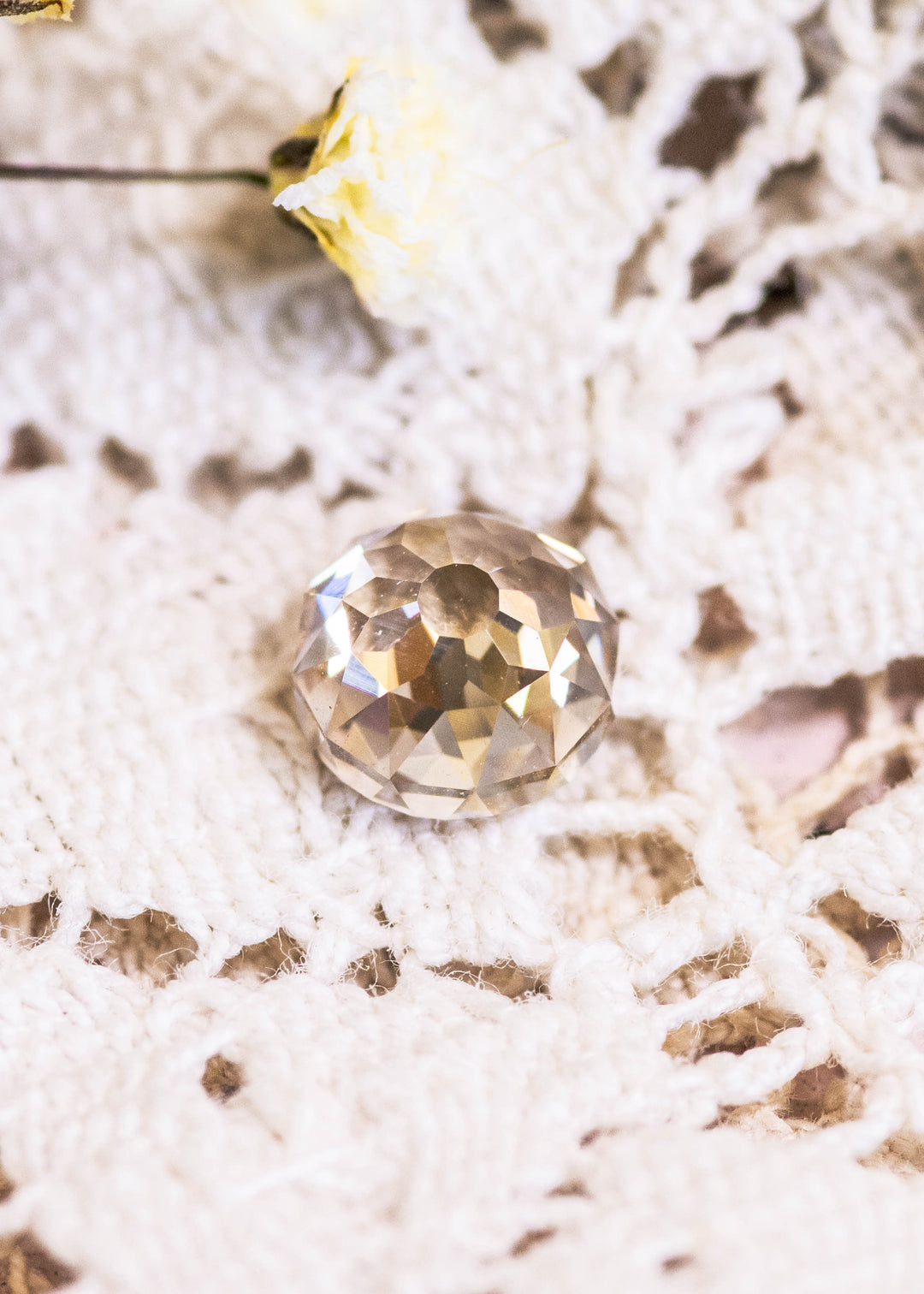 Loose 1.15 carat champagne fancy light brown diamond shown face-up, displaying the Mughal cut pattern and warm golden brown tone.