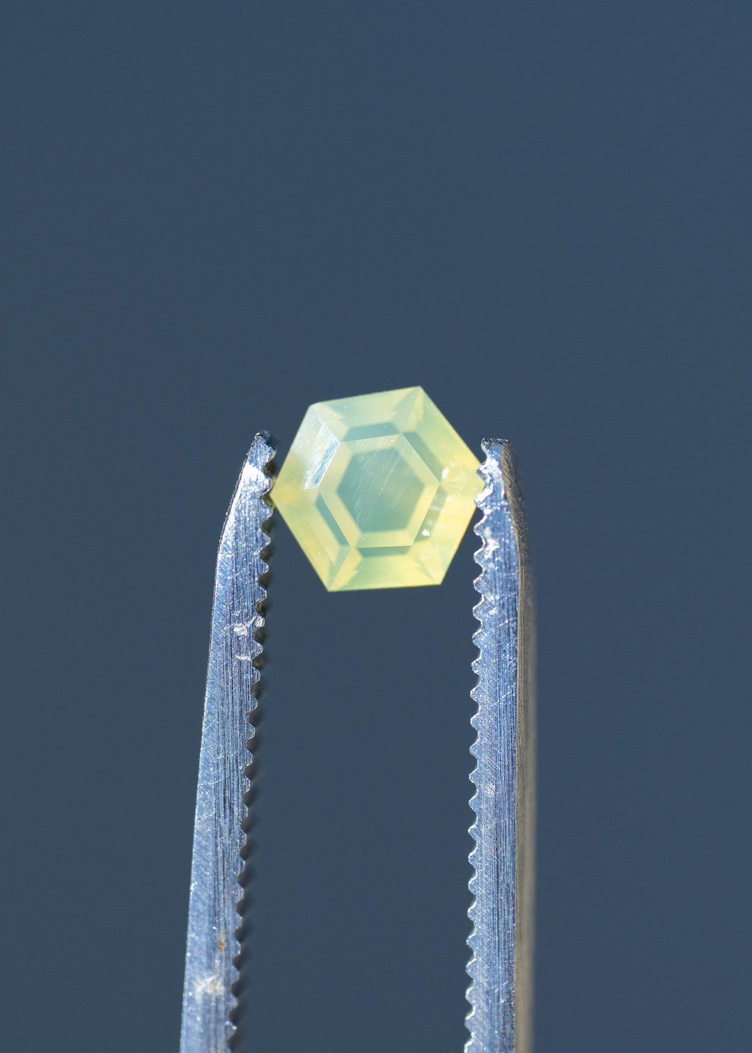 1.23CT Sapphire: Opalescent Yellow Green Precision Hexagonal Tablet Cut