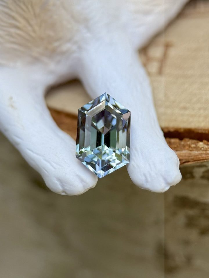 1.52ct Tanzanite gemstone with mermaid hues resting on white antler – elongated step cut hexagon from Merelani Hills