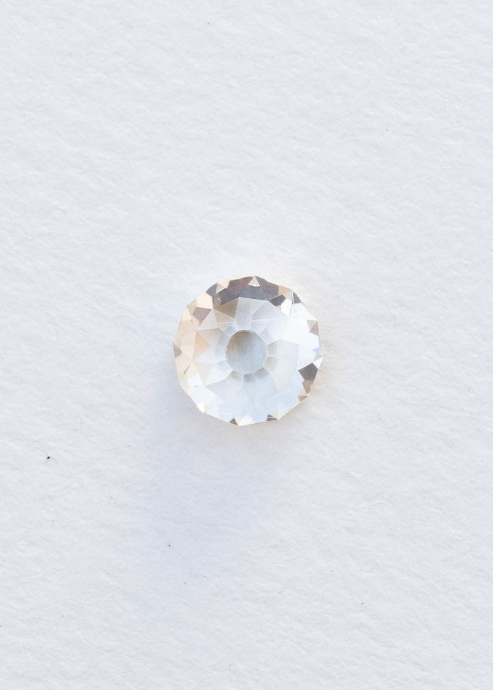 Face-up 1.92 carat round Mughal cut South African diamond on a white background, showing its nearly circular outline, open central table and broad antique-style facets.