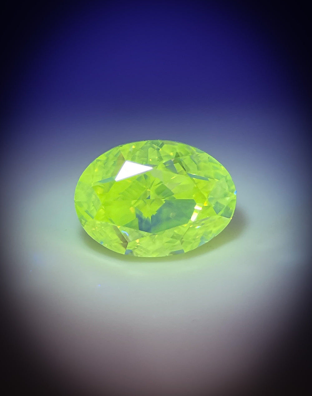 A stunning 2.71-carat faint yellow opalescent diamond, cut in an oval modified brilliant shape. This SI1 clarity diamond from South Africa showcases a fluorescence hues, making it a rare and beautiful gemstone.