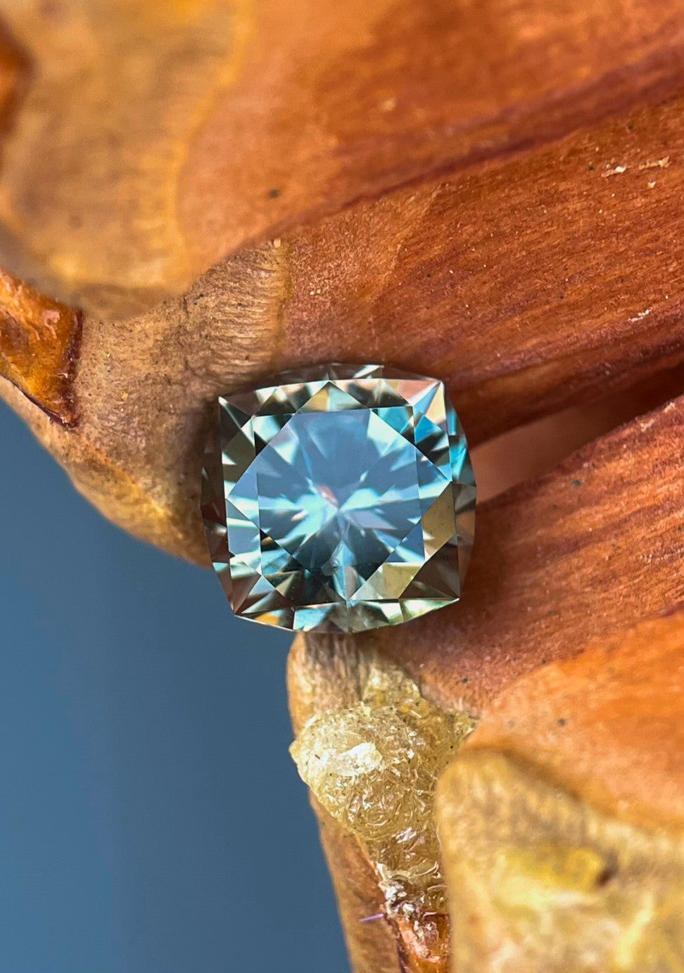 A 3.13-carat color-changing sapphire showcasing hues from grayish green to pinkish purple, crafted in a modified cushion brilliant cut, sourced from the El Dorado Bar Deposit in Montana, USA.