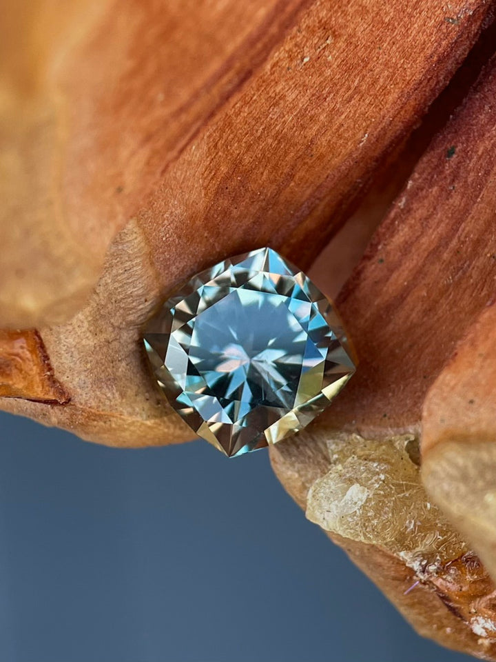 Beautiful cushion brilliant sapphire weighing 3.13 carats, featuring an entrancing grayish green to pinkish purple color shift, untreated and originating from the El Dorado Bar Deposit in Montana.