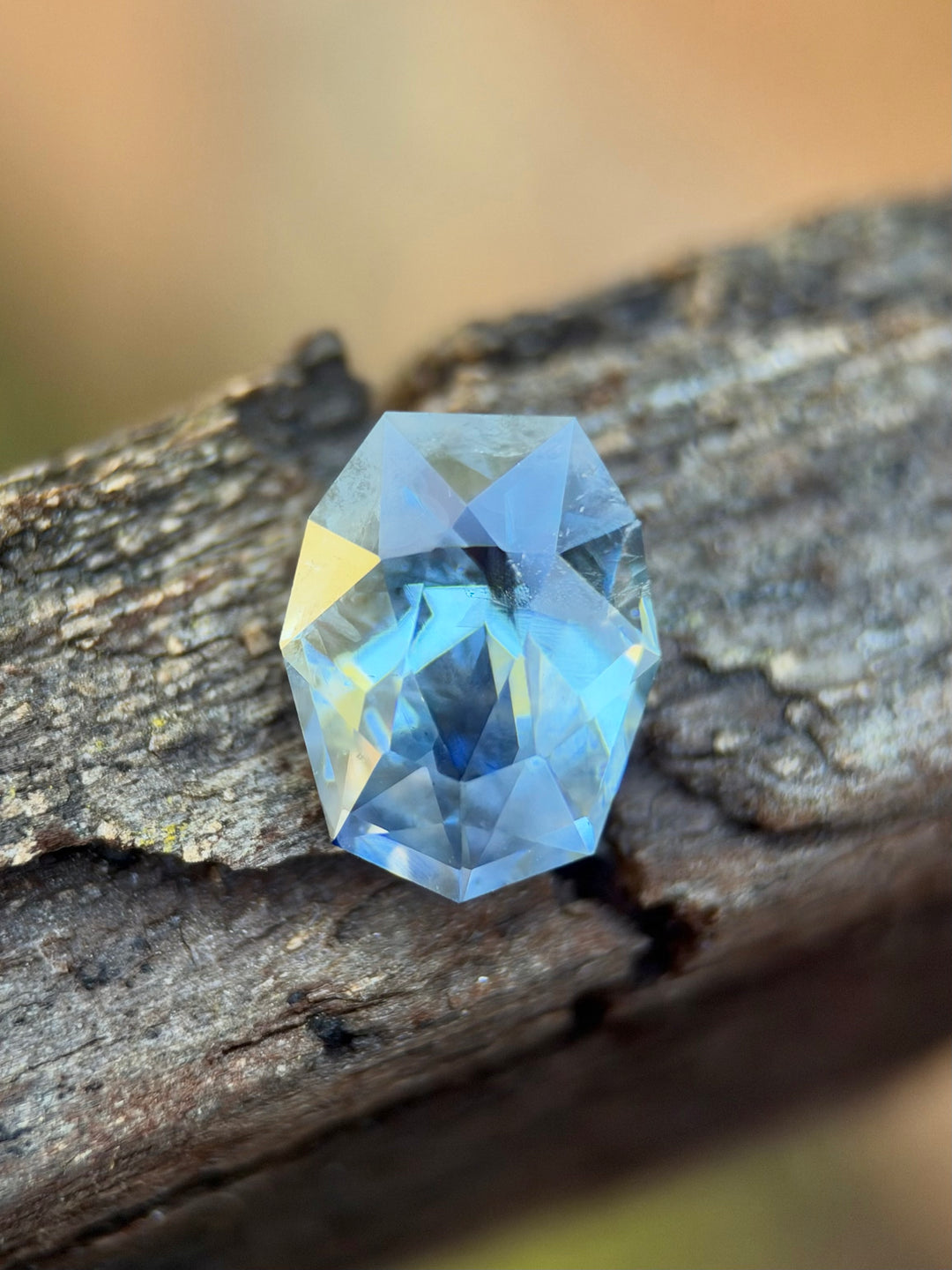 3.67 carat untreated gradient sky denim blue sapphire from Ratnapura, Sri Lanka in a precision custom shield mixed cut