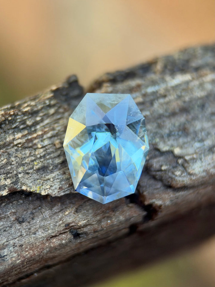 3.67 carat untreated gradient sky denim blue sapphire from Ratnapura, Sri Lanka in a precision custom shield mixed cut