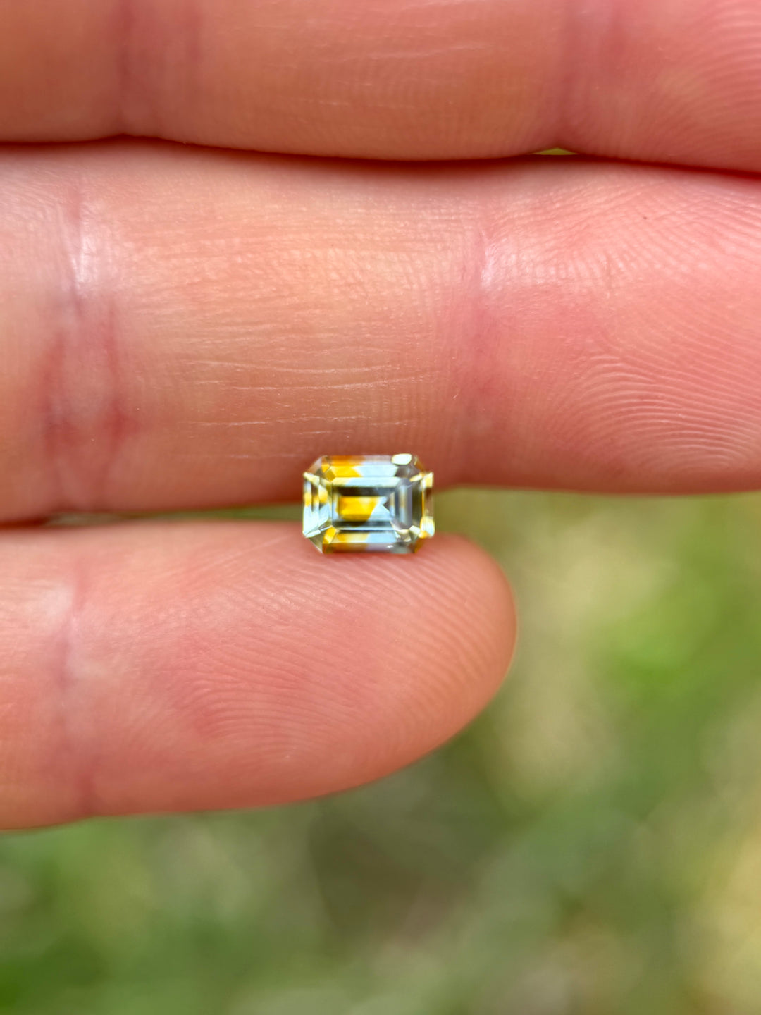 1.10 Sapphire: Orange Yellow Colorless Parti Precision Emerald Cut