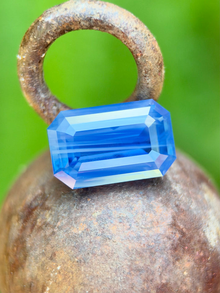 5.30 carat opalescent banded Kashmir blue sapphire from Ratnapura, Sri Lanka in a precision elongated emerald cut