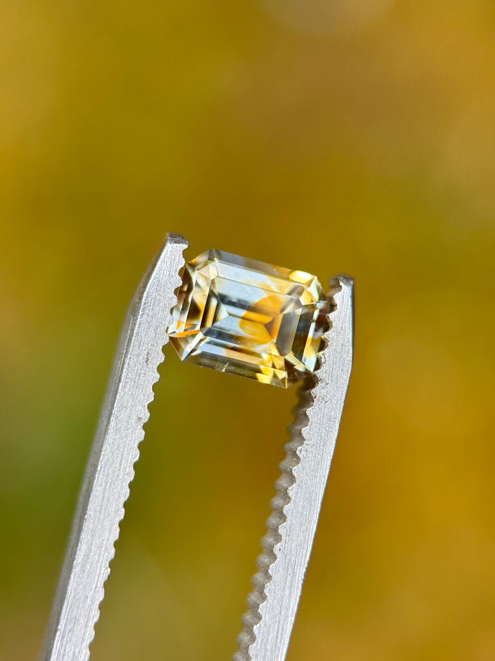 1.10 Sapphire: Orange Yellow Colorless Parti Precision Emerald Cut
