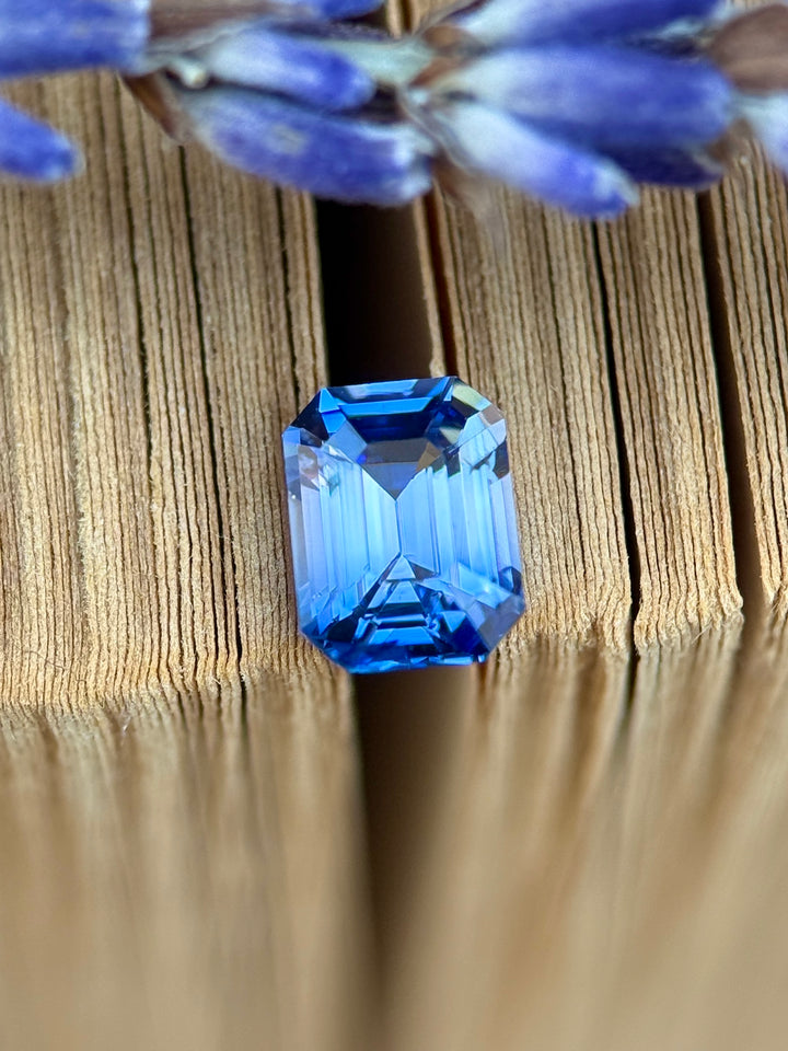 1.04CT Sapphire: Royal Blue And Colorless Parti Emerald Cut
