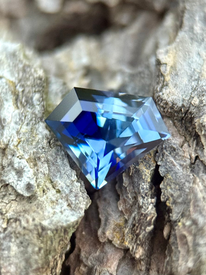 1.60CT Sapphire: Inky Royal Blue-Blue Colorless Parti Shield Step Cut