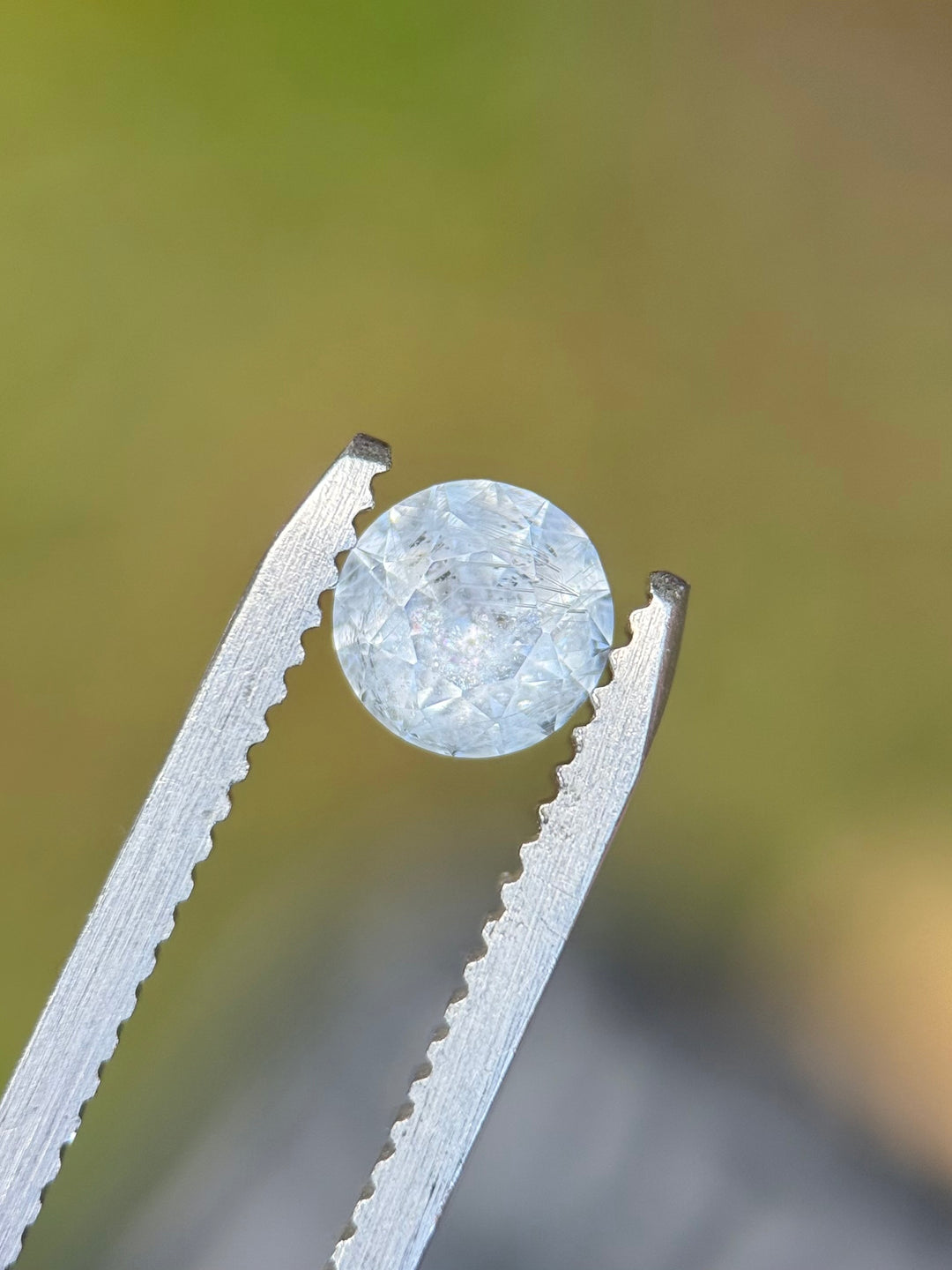 0.87CT Sapphire: Icy White Grey Silver Round Brilliant Cut