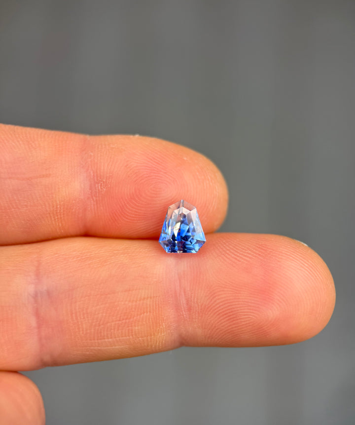 2.42CT Sapphire: Vibid Blue And Colorless Parti Custom Geo Shield Step Cut