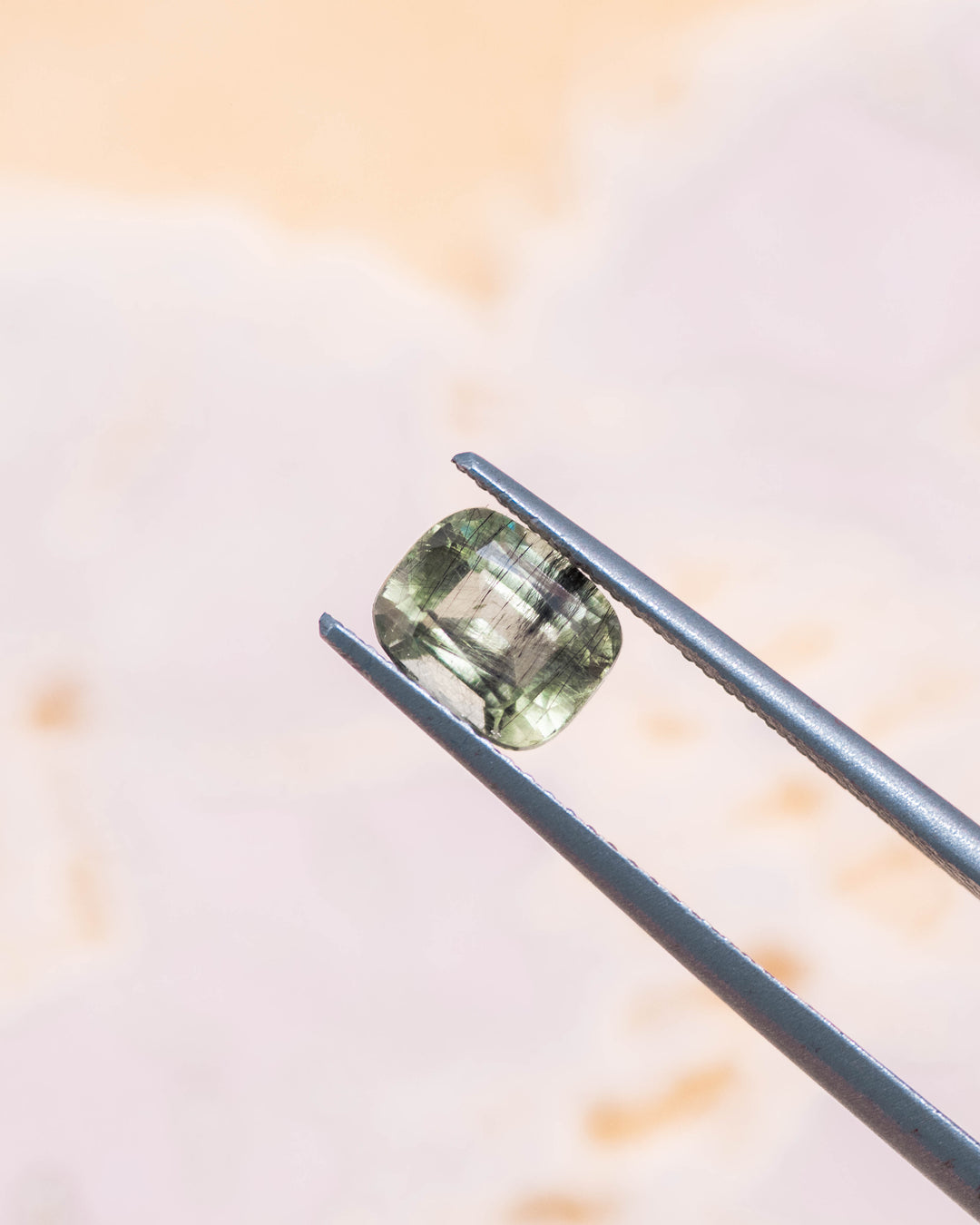 1.45CT Peridot: Green Black Cushion Mix Cut