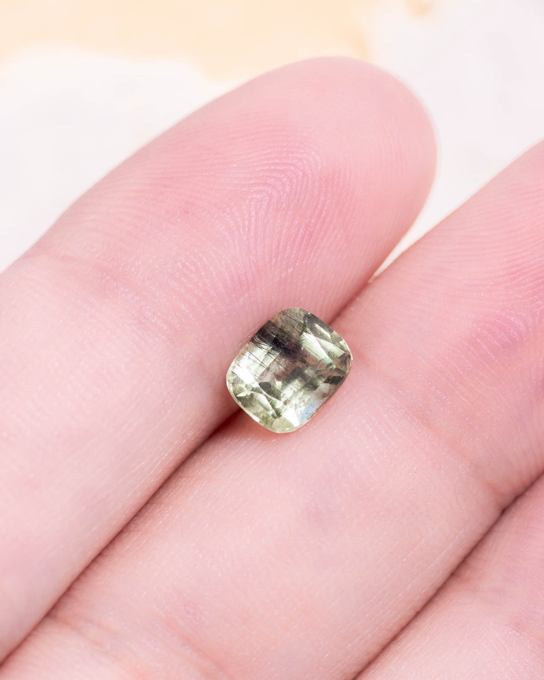 1.45CT Peridot: Green Black Cushion Mix Cut