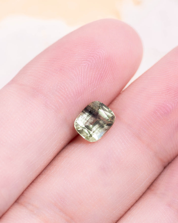 1.45CT Peridot: Green Black Cushion Mix Cut