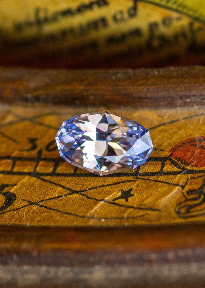 1.26CT Sapphire: Colorless Periwinkle Parti Precision Custom Elongated Geo Oval Brilliant Cut