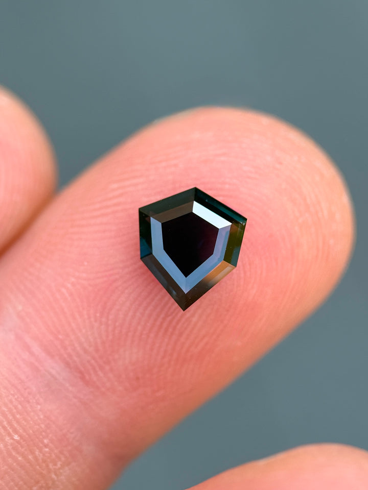 1.37CT Sapphire: Deep Blue Shield Portrait