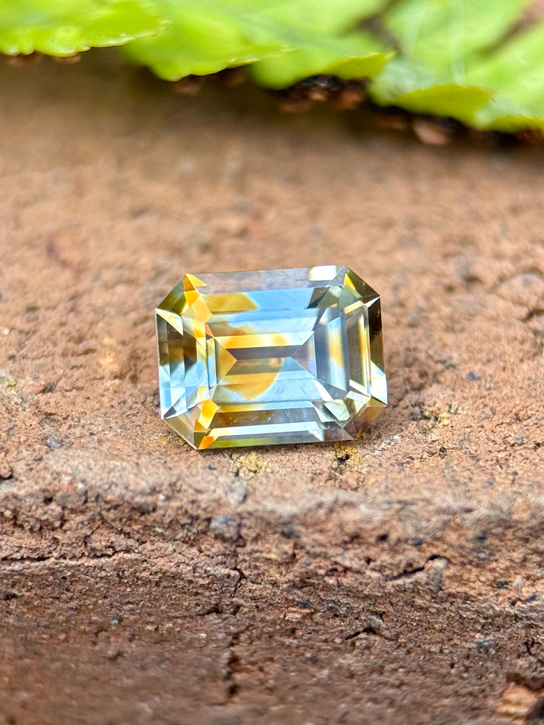 1.10 Sapphire: Orange Yellow Colorless Parti Precision Emerald Cut