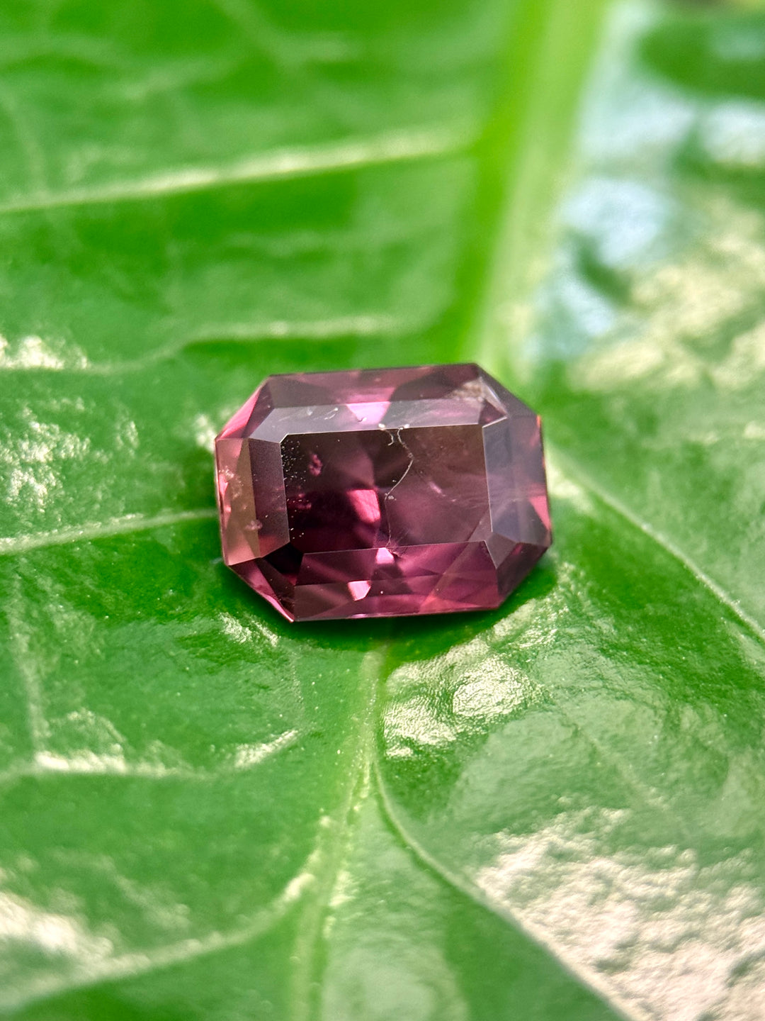 1.77CT Sapphire: Red, Brown, and Purple Modified Emerald Cut
