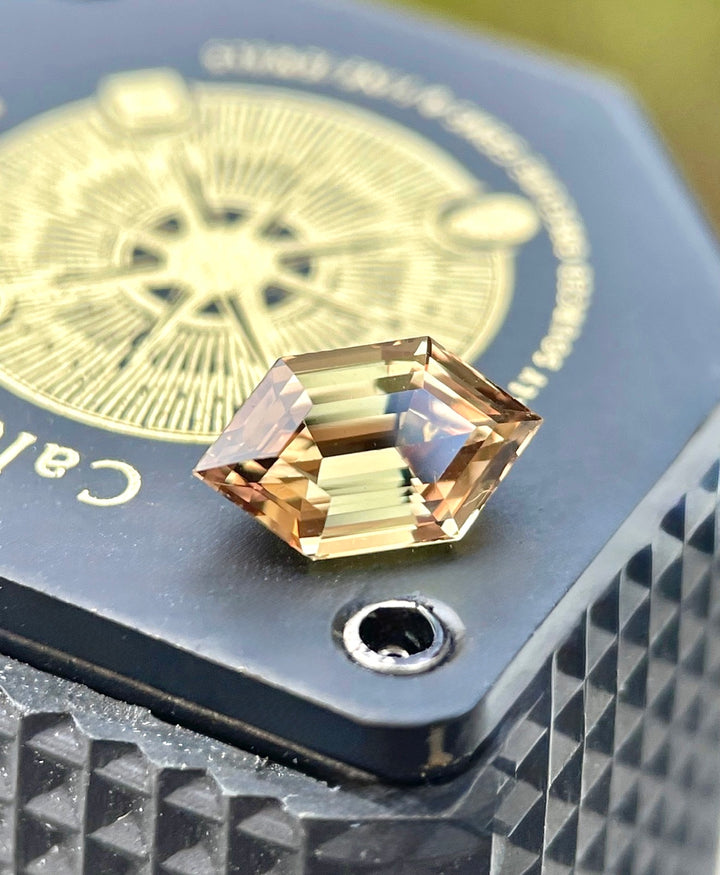 1.22CT Sapphire: Pinkish Orangish Champagne Brown Elongated Hexagon Step Cut