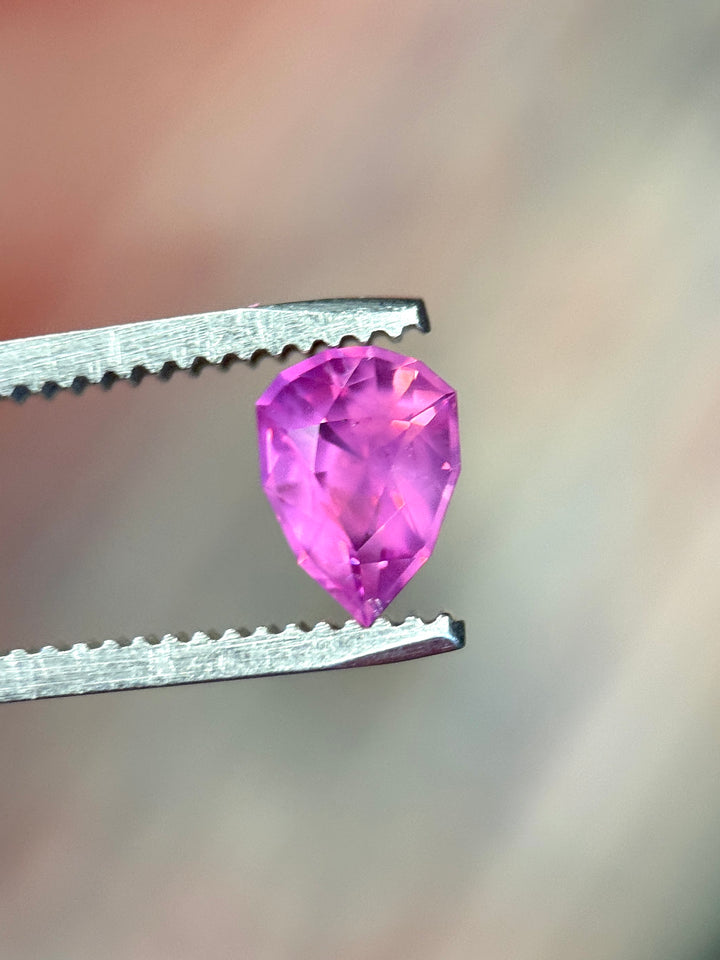 1.24CT Sapphire: Opalescent Hot Purplish Pink Precision Geometric Pear Modified Brilliant Cut
