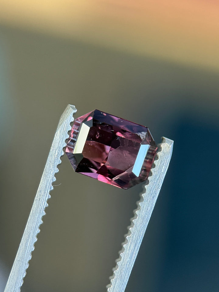 1.77CT Sapphire: Red, Brown, and Purple Modified Emerald Cut