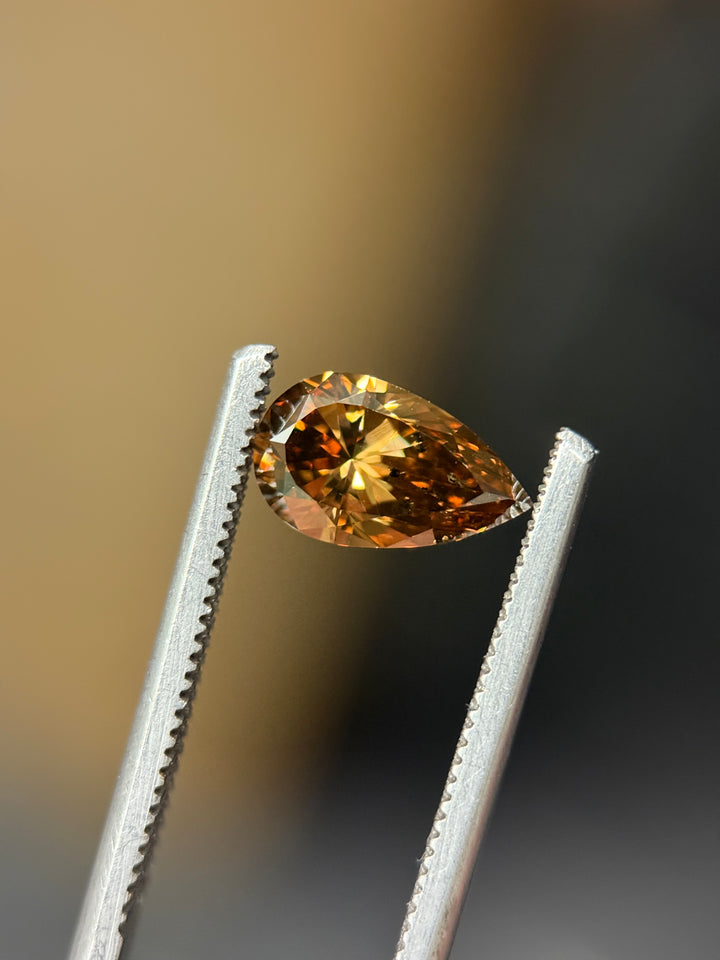 1.65CT Diamond: Fancy Orange Brown Elongated Pear Brilliant With Museum Quality Bi Color Fluorescence