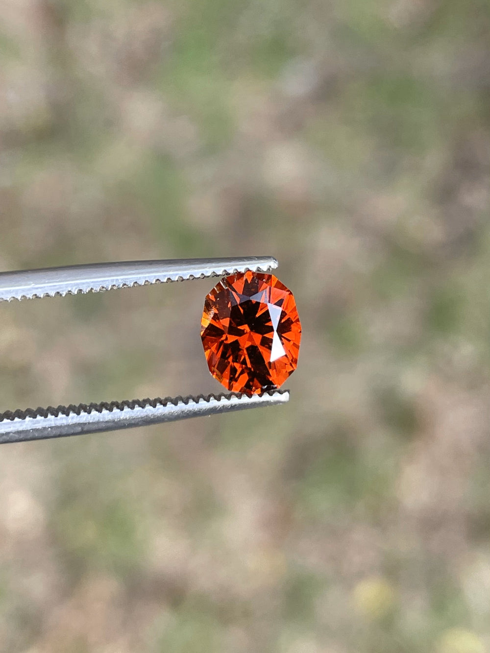 High-quality Hessonite Garnet gemstone, 1.68 carats, in stunning red-orange, Kenya-sourced.