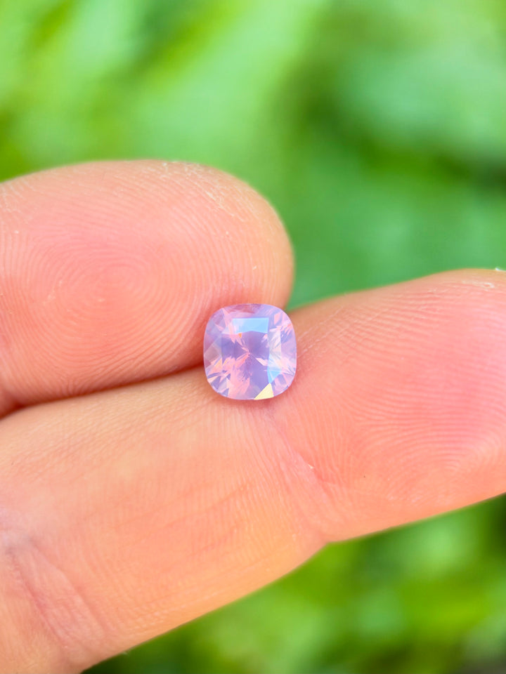 Natural untreated lavender pink sapphire weighing 2.00 carats and measuring 7.00 × 6.80 mm, custom cushion cut in a nearly square silhouette.
