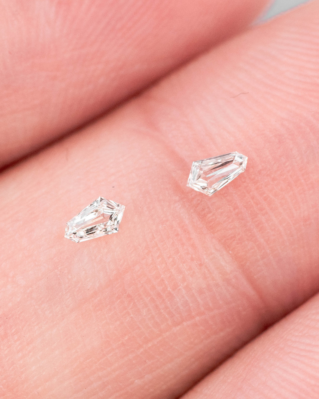 Fine 0.10ct Matched Diamond Pair: F-G Color Kite Step Cuts, Untreated, VVS-VS