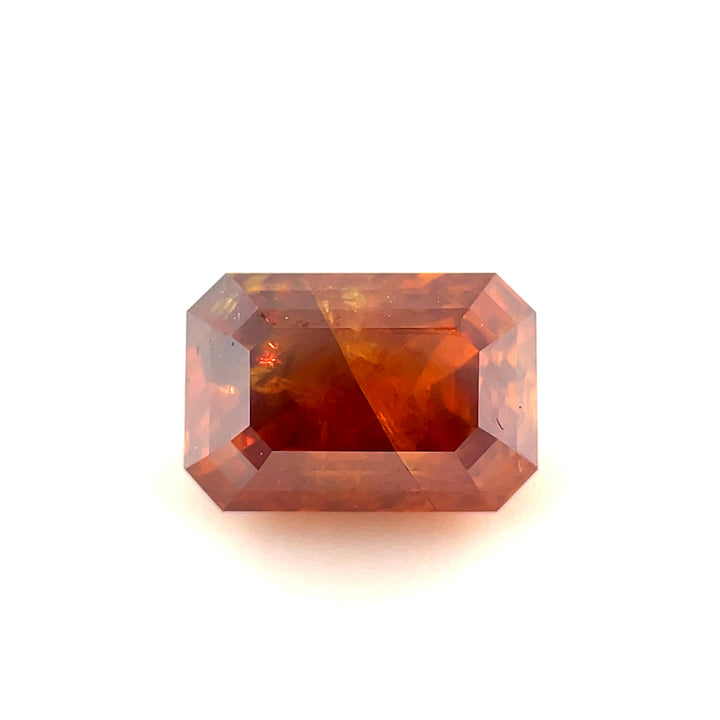 A luxurious 1.02-carat emerald step-cut diamond with a deep brown-orange cognac hue. Featuring a mesmerizing step-cut pattern, this diamond is an elegant choice for fine jewelry.
