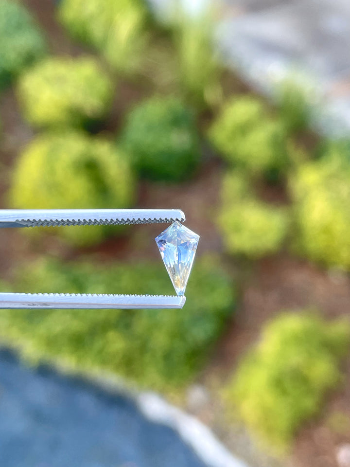 Exquisite 1.20 carat sapphire, custom mix kite cut, brilliantly displaying shades of yellow and cornflower, with precise dimensions of 9.52mm x 5.64mm x 3.89mm, from Sri Lanka, untreated.
