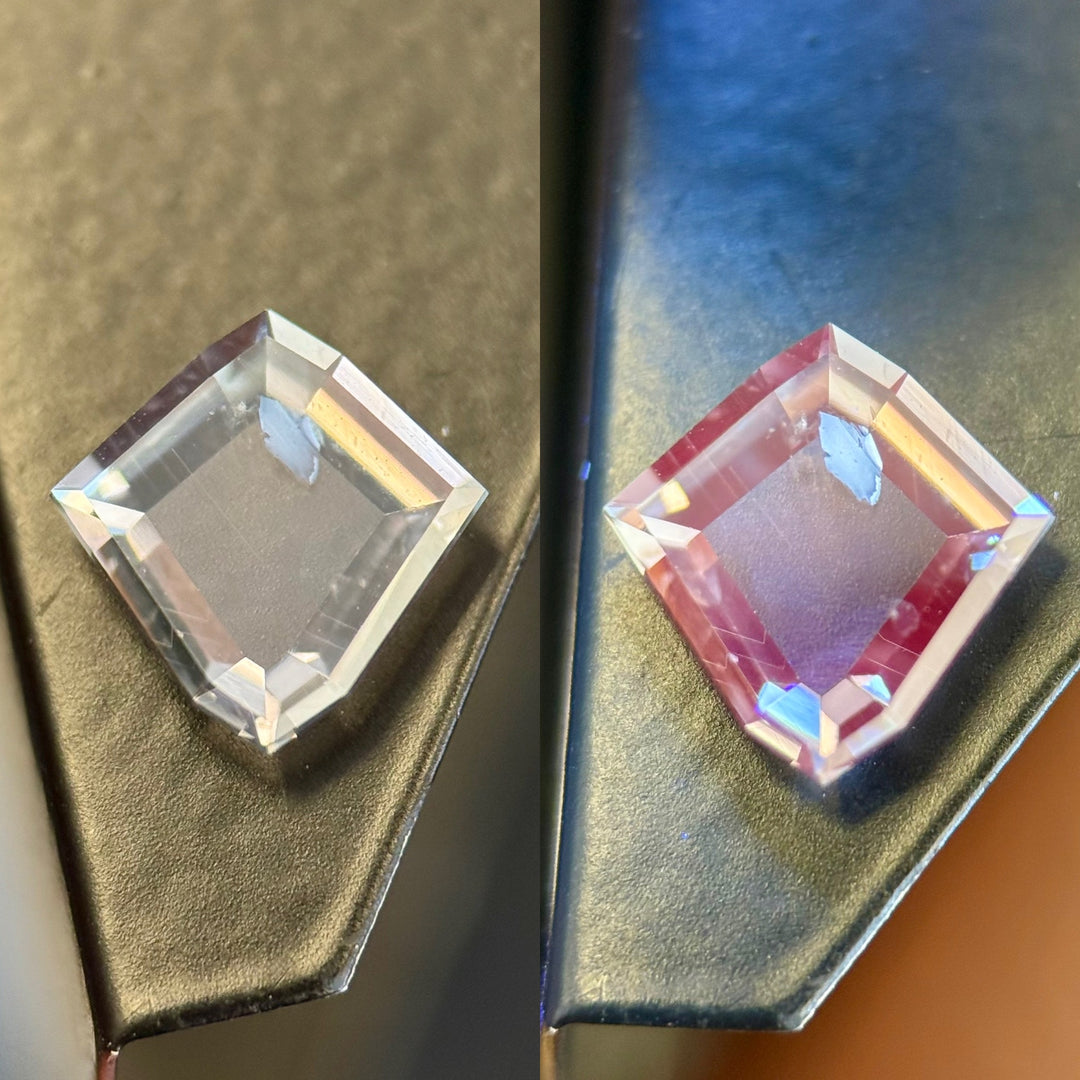 Montana color change sapphire in shield portrait cut showing icy lavender and rosy pink tones under mixed lighting.