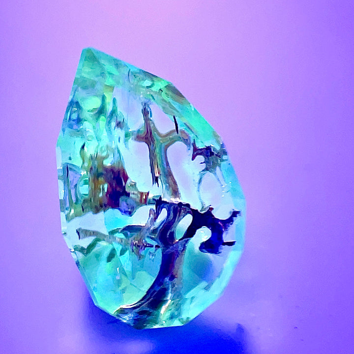 4.18CT Hyalite Opal: Clear White Orange Brown and Fluorescent Step Cut Pear