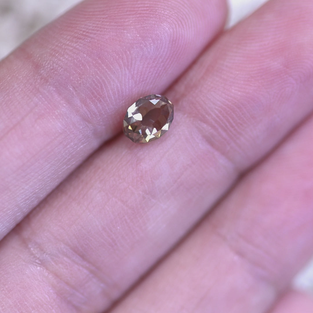 Rotating loose fancy brown champagne Mughal cut diamond from South Africa, revealing its warm tones and antique-style brilliance in shifting light.