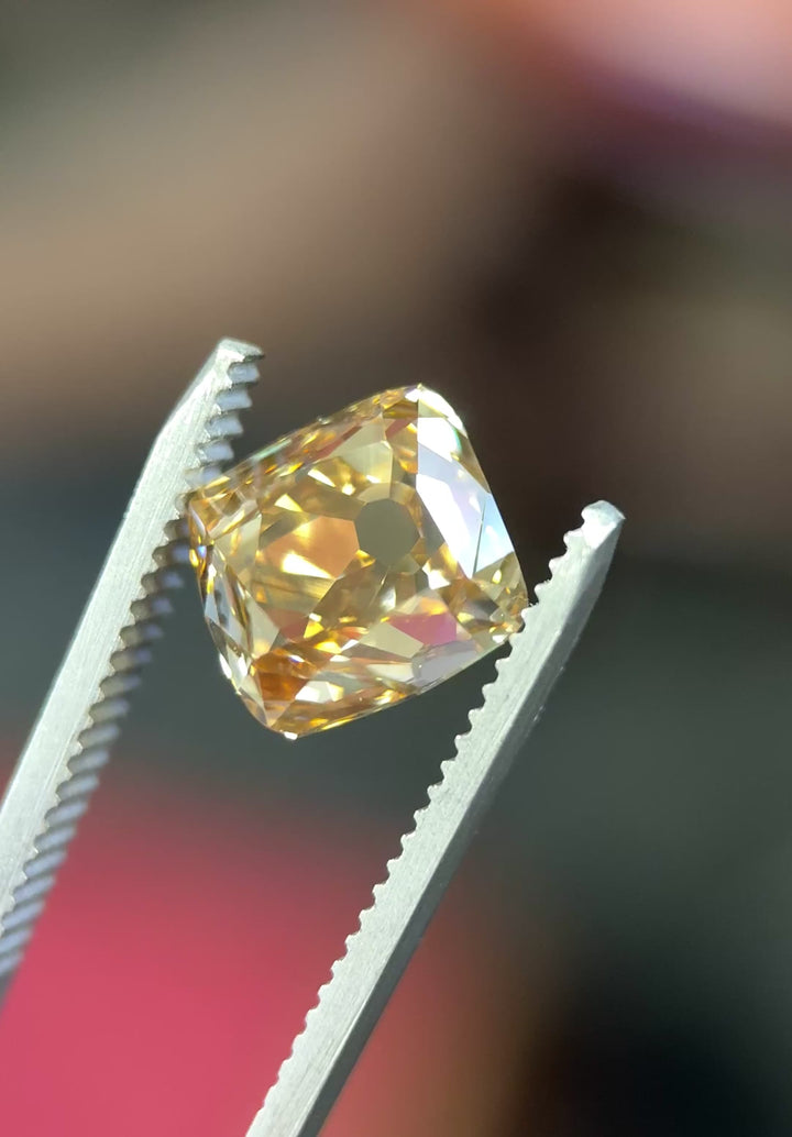 Close-up video showcasing the depth of color and brilliance in a 5.21 carat untreated Fancy Brown Champagne Diamond from the Ekati Mine.