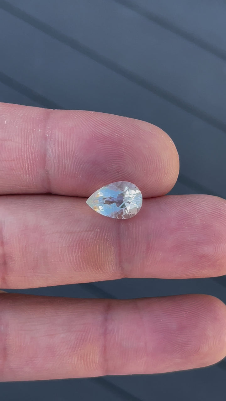 Close-up video of a 2.30-carat hyalite opal, demonstrating its stunning clarity and precise faceting,.