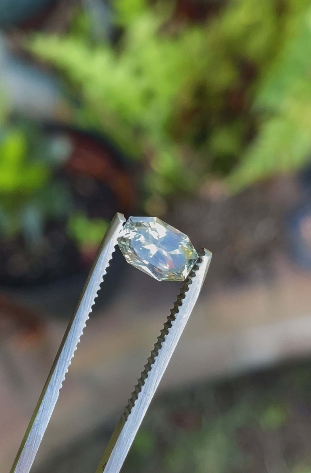 Video showcasing Color Shift Sapphire, Yellow Green to Powder Blue, Custom Mix Cut Geometric Octagon, 2.00 Carats, 8.75 x 5.79 x 4.20 mm, Originating from Sri Lanka, No Treatment, $2000.00 Price