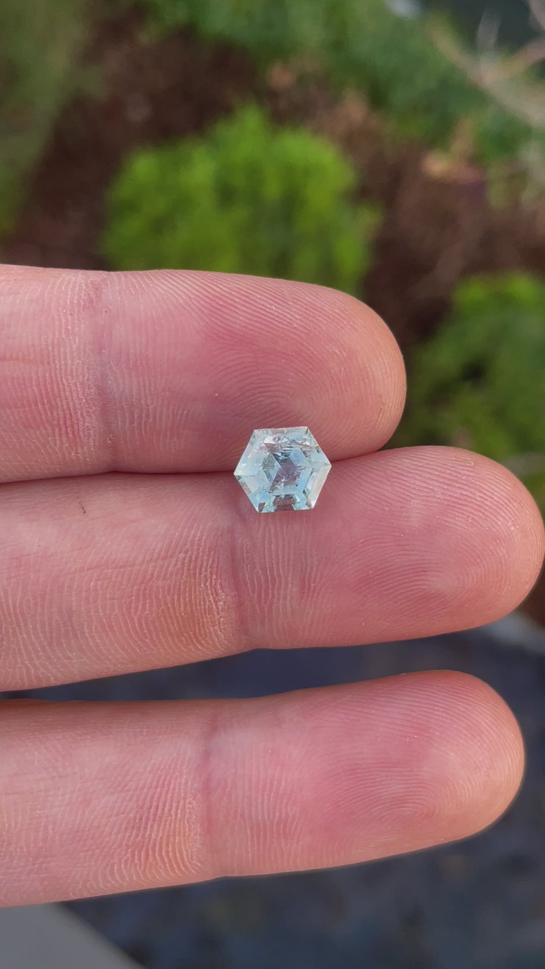 A close-up video highlighting the flawless angles and geometric symmetry of the 2.20ct Green Beryl from Nigeria.