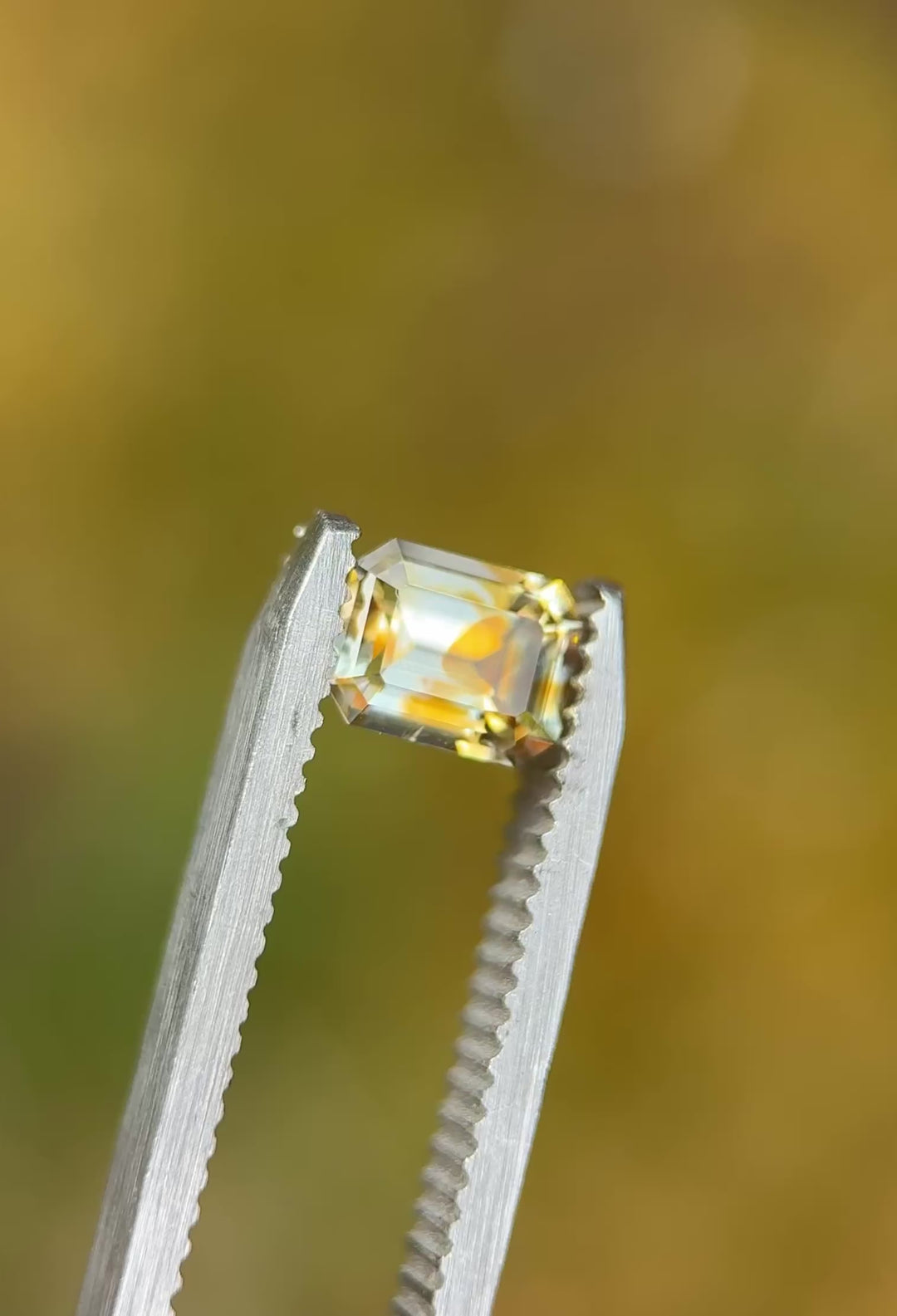 1.10 Sapphire: Orange Yellow Colorless Parti Precision Emerald Cut
