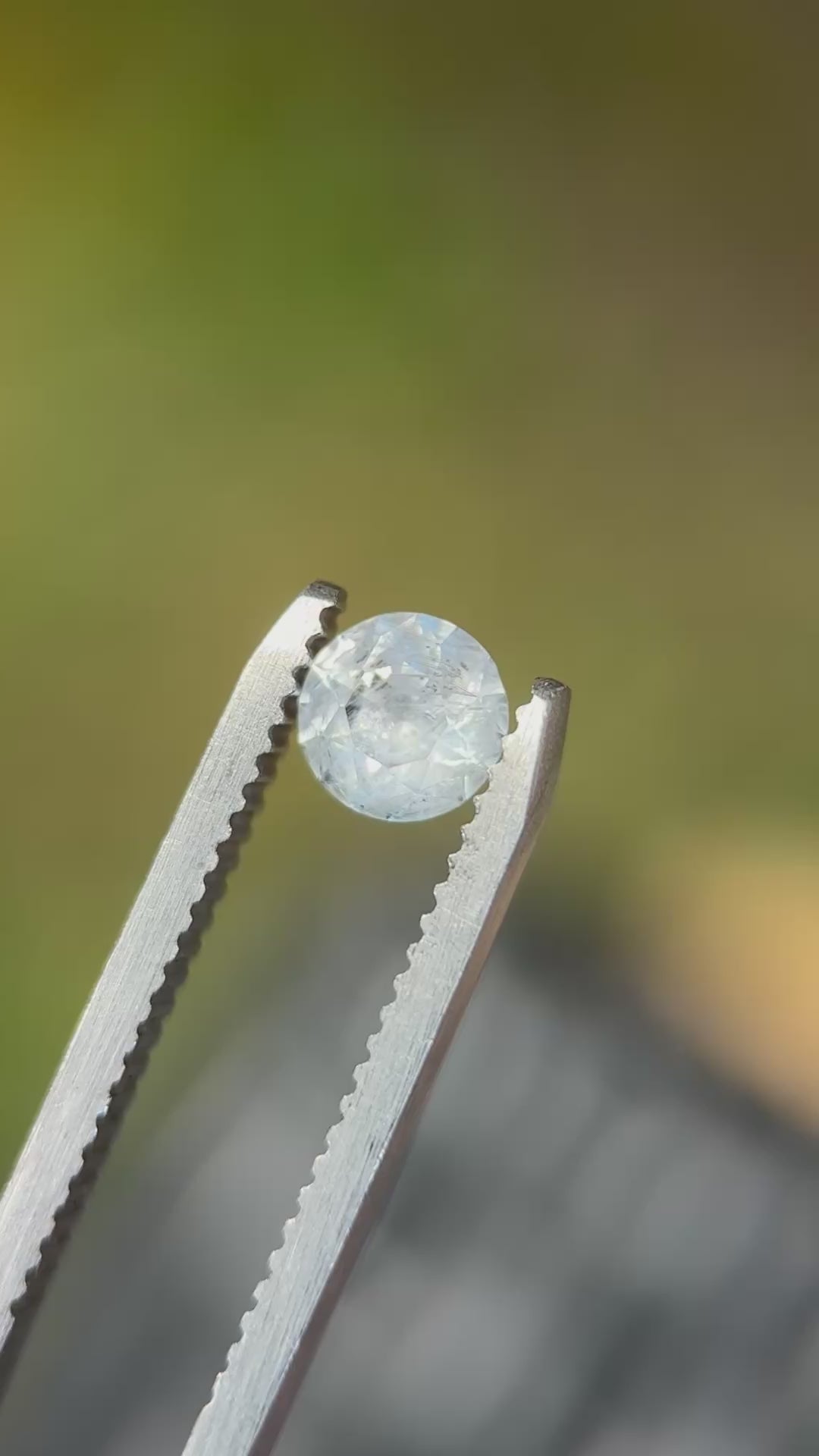 0.87CT Sapphire: Icy White Grey Silver Round Brilliant Cut