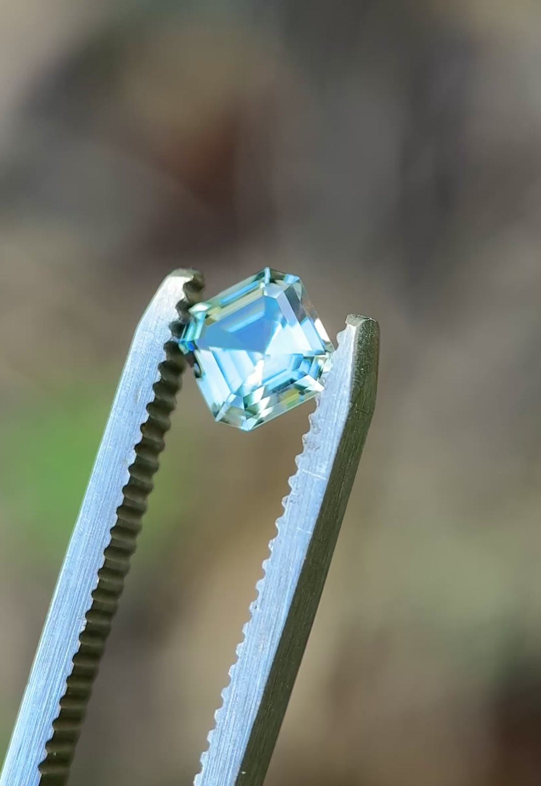 0.90 Carat Natural Aqua Teal Blue Sapphire tweezer video