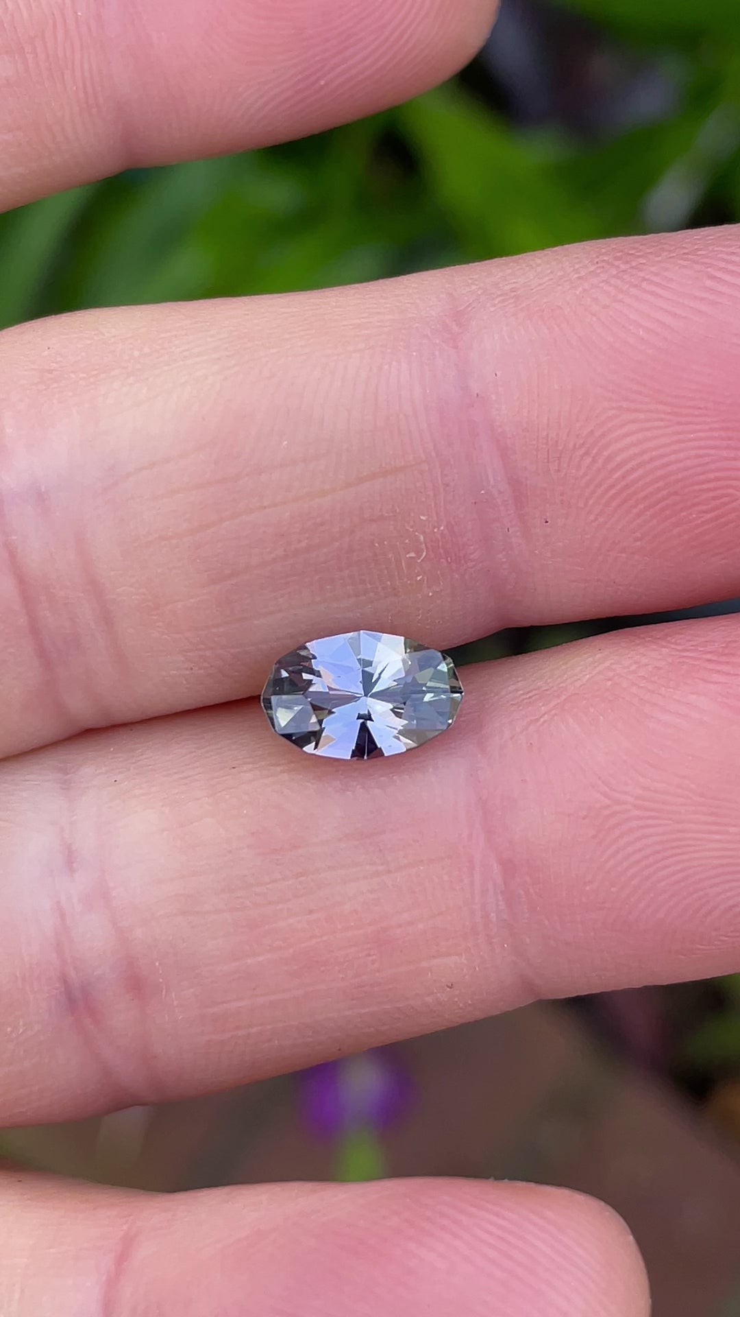 Video showcasing the vivid color play and brilliance of a 1.78ct untreated Tanzanite from Tanzania in an elegant oval geometric cut.
